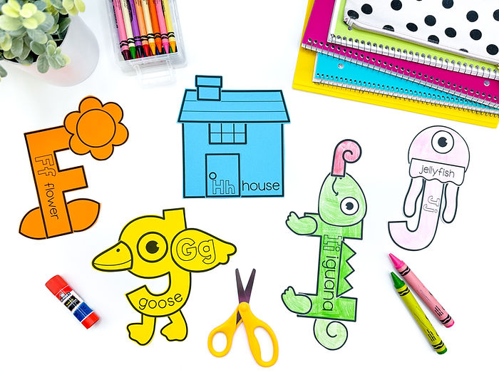 A photo of the alphabet crafts. These crafts include flower, goose, house, iguana, and jellyfish.