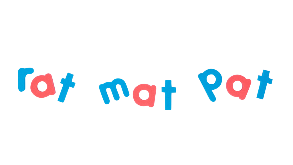 202207MPletters2 - Cultivating Brilliant Minds letter tiles placed to spell the words "rat" "mat" and "pat"