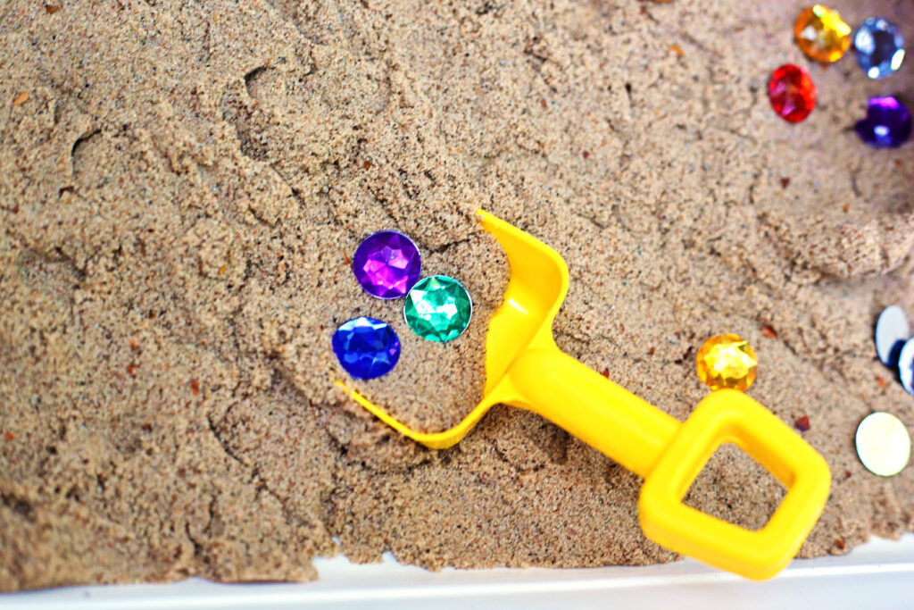 Dragon_s Lair Sensory Bin 5 - Cultivating Brilliant Minds Dragon's Lair Sensory Bin Finding the gems