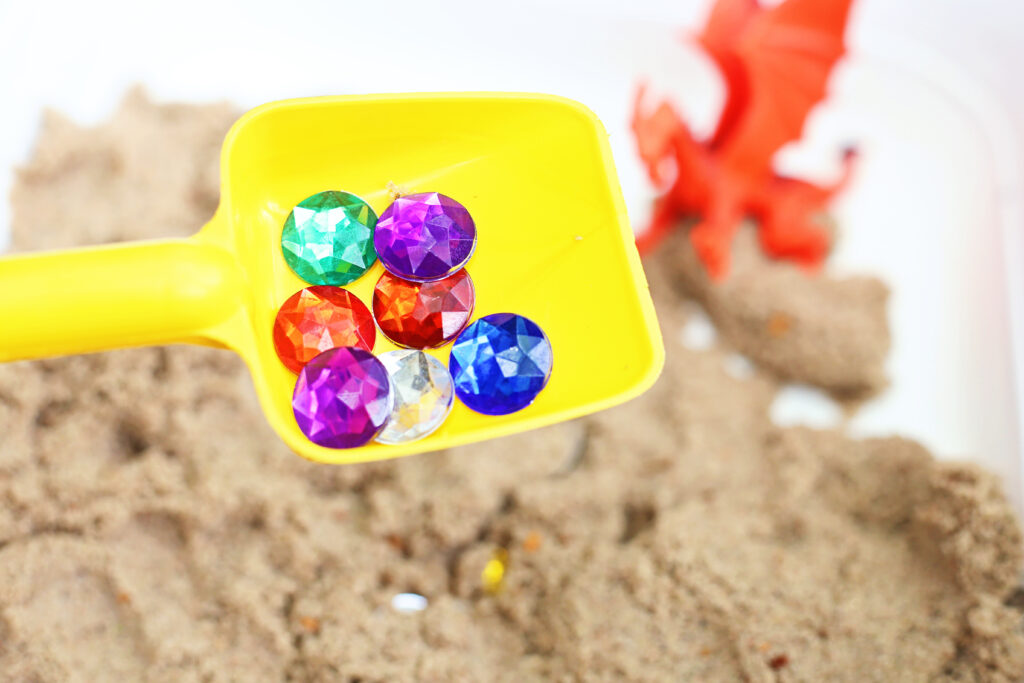Dragon_s Lair Sensory Bin 8 - Cultivating Brilliant Minds Dragon's Lair Sensory Bin finding the gems