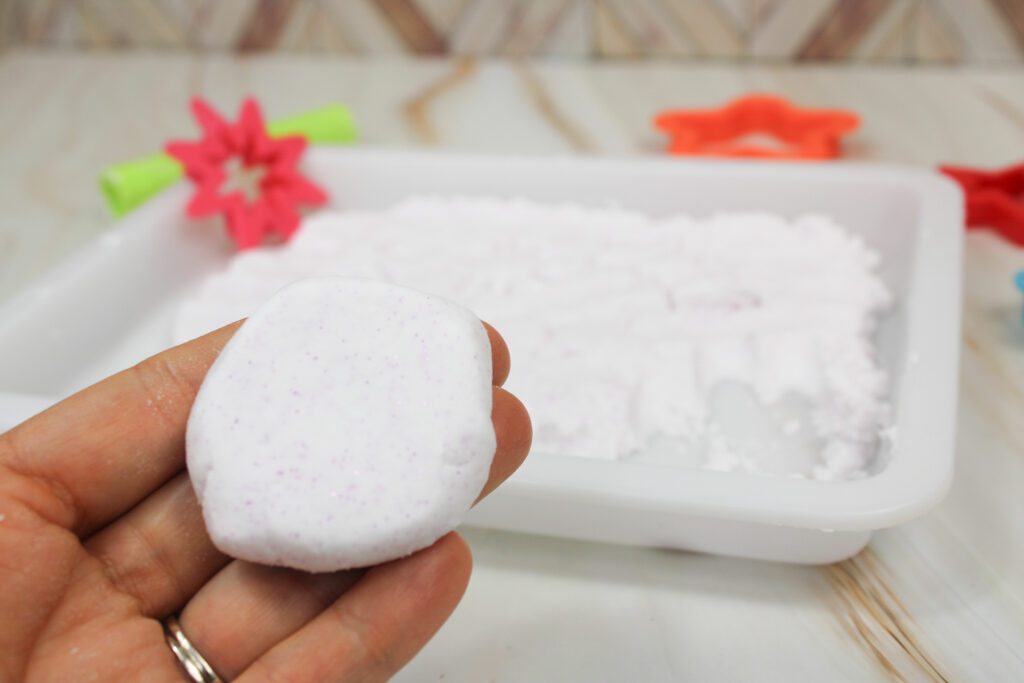 IMG_0052 - Cultivating Brilliant Minds a hand holding the glitter cloud dough