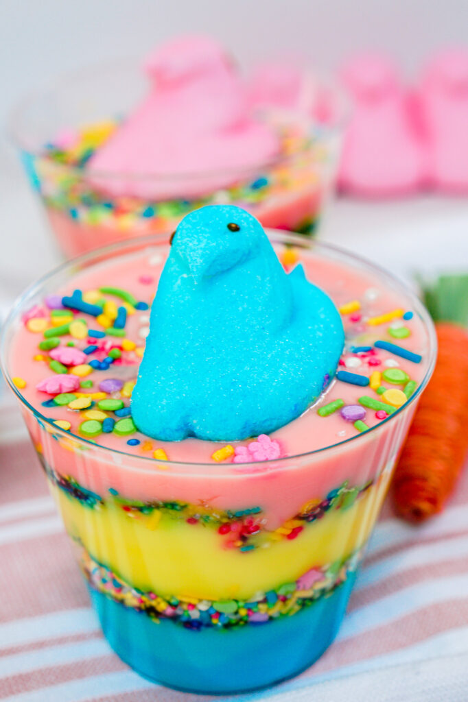 peeps pudding cups set 4-09 - Cultivating Brilliant Minds adding a fluffy peep on top