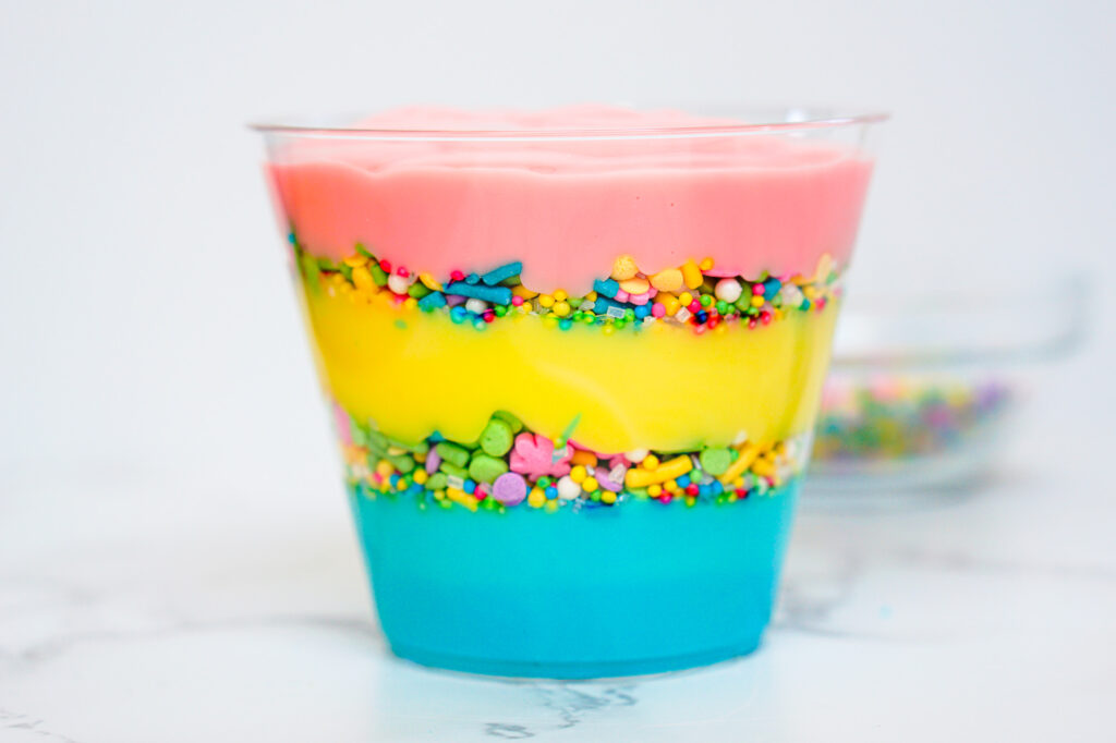 peeps pudding cups shared process-11 - Cultivating Brilliant Minds finishing the layers of pudding and sprinkles