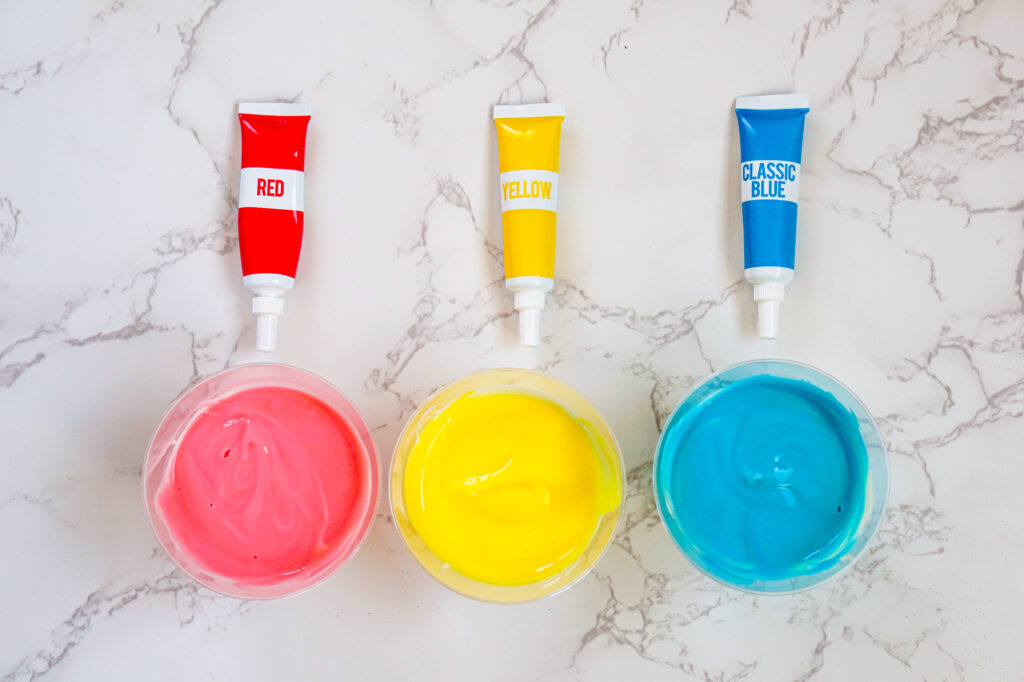 peeps pudding cups shared process-32 - Cultivating Brilliant Minds stiring in the food coloring