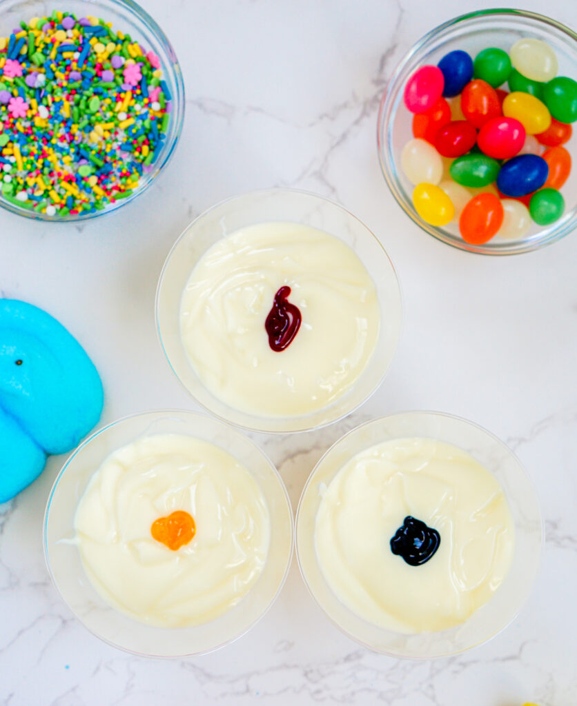 peeps pudding cups shared process-35 - Cultivating Brilliant Minds adding food coloring to the pudding cups