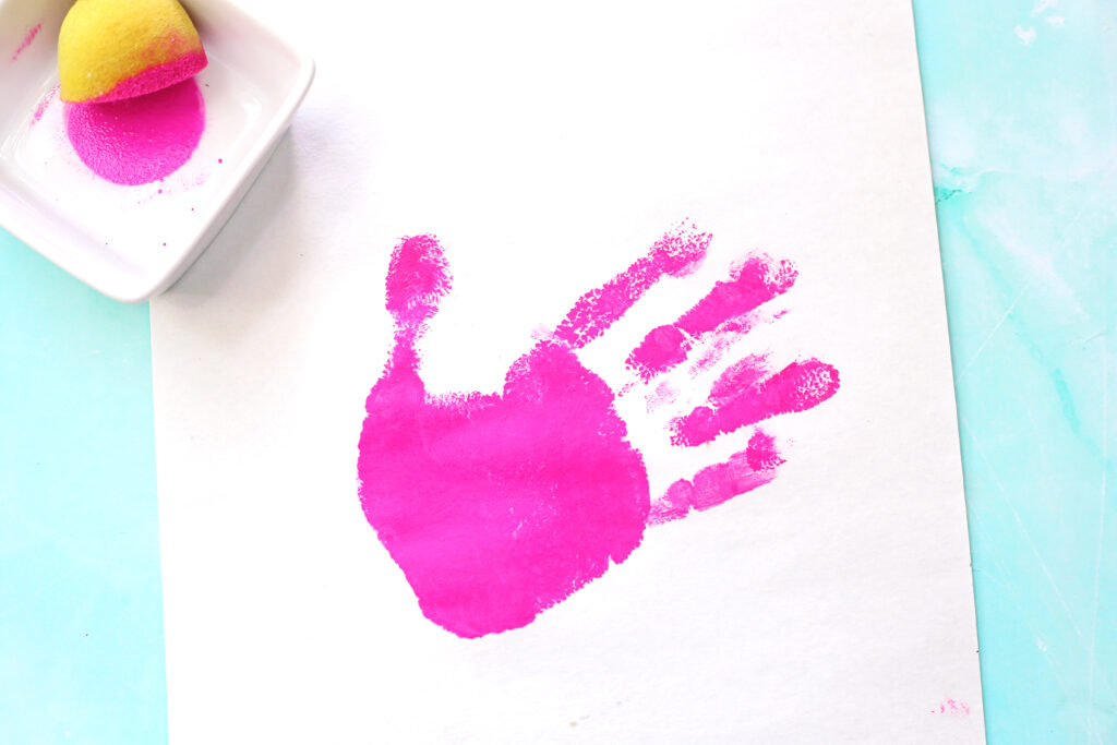 Stamp Hand on Paper - Cultivating Brilliant Minds stamp the handprint