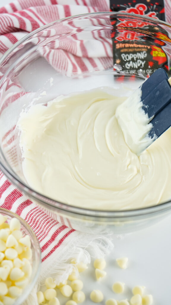 firecracker fudge-45 - Cultivating Brilliant Minds mixing the frosting and chocolate