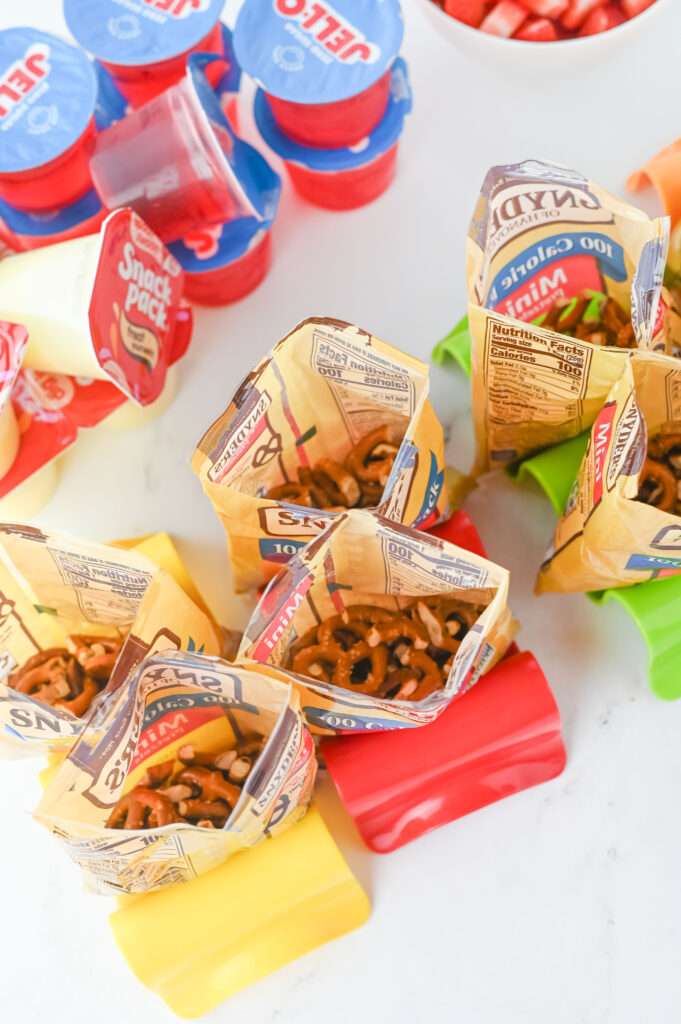 walkingstrawberrypretzelsalads2 - Cultivating Brilliant Minds crushing the pretzels