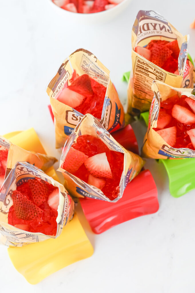 walkingstrawberrypretzelsalads5 - Cultivating Brilliant Minds adding in the strawberry