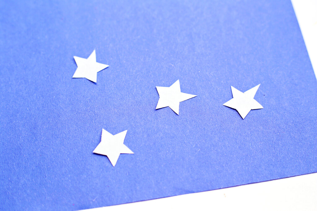 Cut White Star Shapes - Cultivating Brilliant Minds firecracker rocket craft