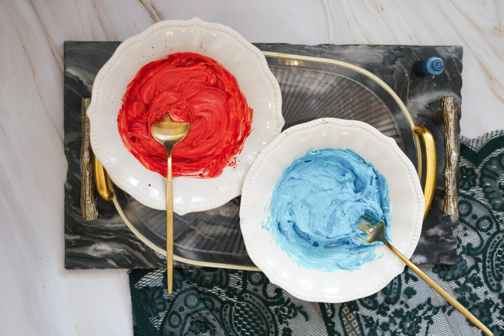 DSC03705 - Cultivating Brilliant Minds add food coloring to the frosting