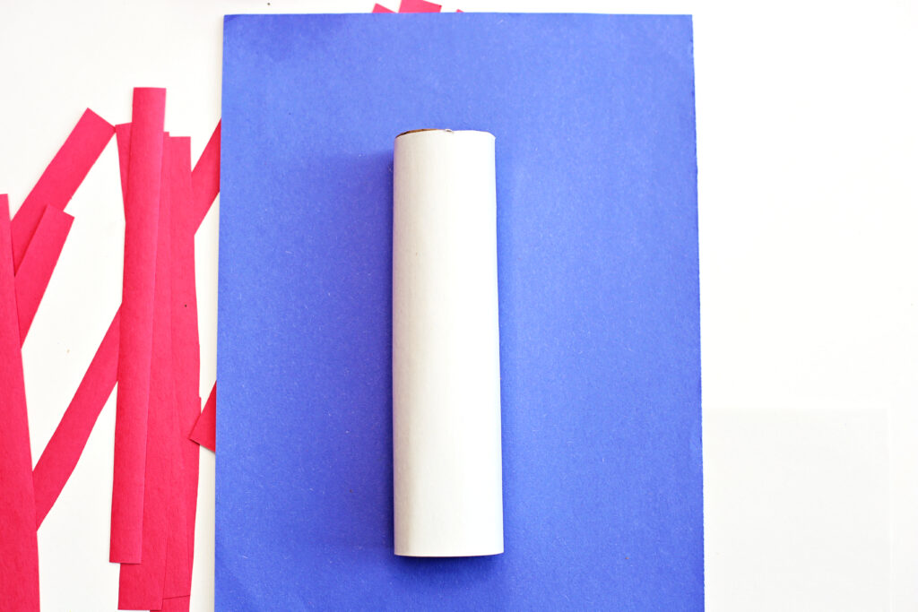 Glue White Construction Paper to Paper Towel Roll - Cultivating Brilliant Minds firecracker rocket craft
