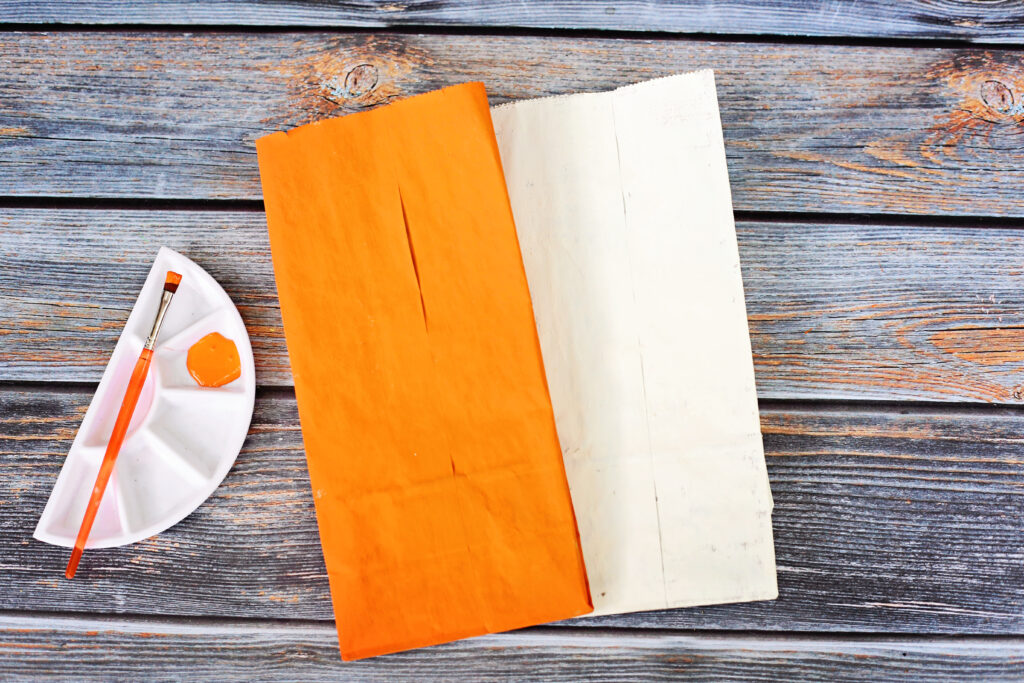 Paint Paper Bags - Cultivating Brilliant Minds paint the bags orange and/or white