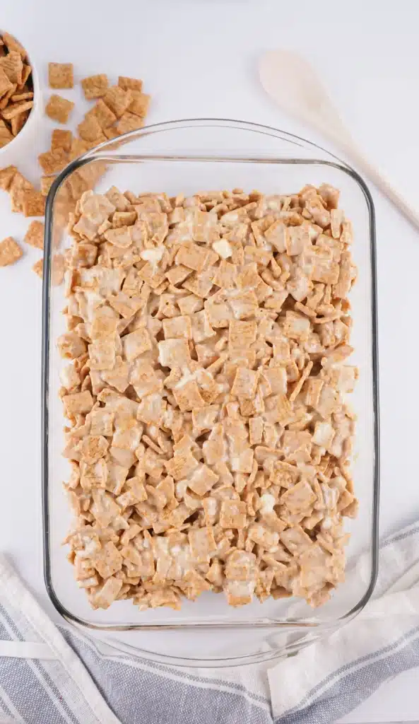 Cinnamon Toast Crunch Treats - Cultivating Brilliant Minds cinnamon toast crunch, butter and marshmallows pressed into a pan