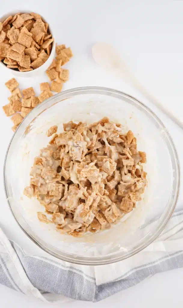 Cinnamon Toast Crunch Treats - Cultivating Brilliant Minds cinnamon toast crunch, butter and marshmallows in a bowl