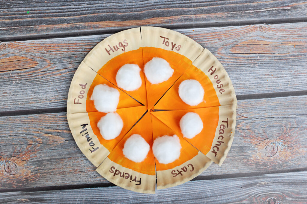 Arrange into pie shape - Cultivating Brilliant Minds paper plate thankful pumpkin pie craft