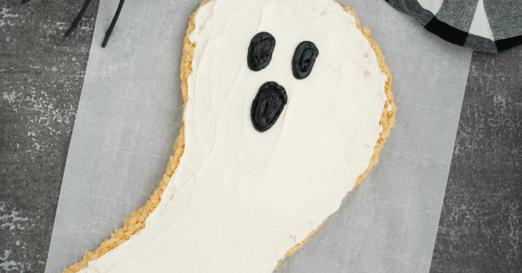rice krispie cereal shapes into a ghost with white icing