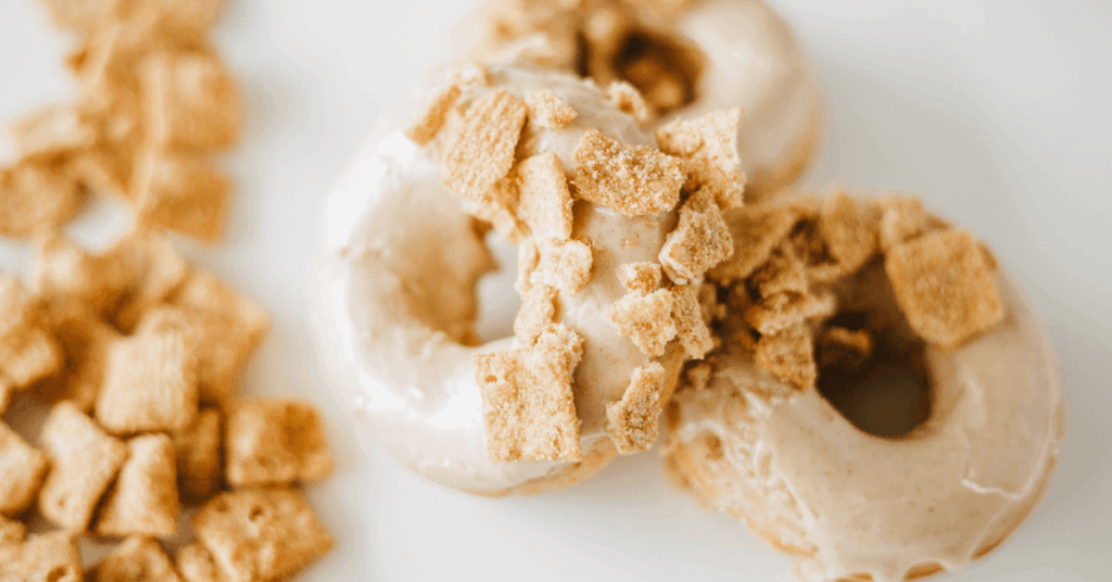 donuts with cinnamon toast crunch cereal on them