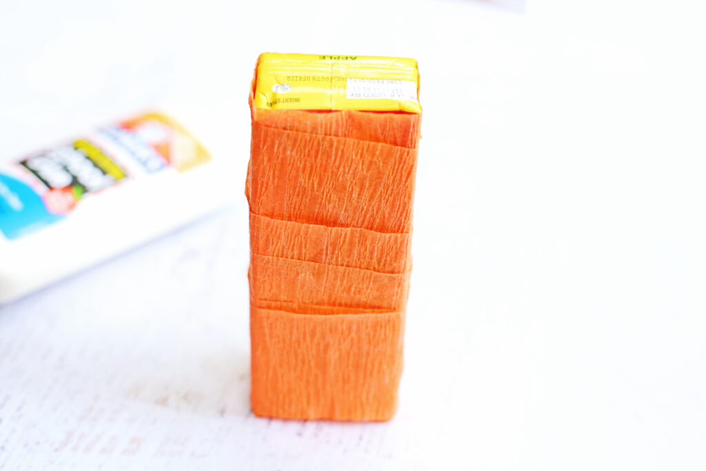 Completely wrap juice box - Cultivating Brilliant Minds wrap the juice box with the crepe paper