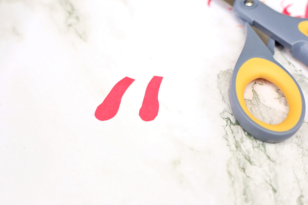 Cut Wattle - Cultivating Brilliant Minds a close up of the red construction paper cut out to look like a waddle