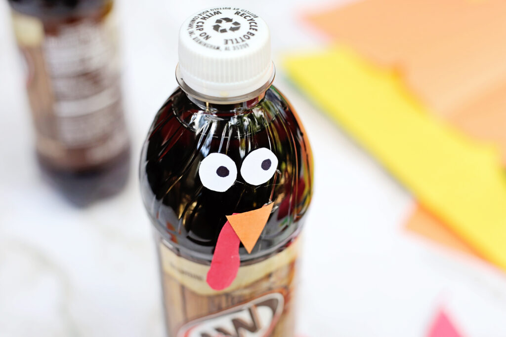Glue Face Details - Cultivating Brilliant Minds Turkey Root Beer Drink with the eyes, beak, and wattle glued on