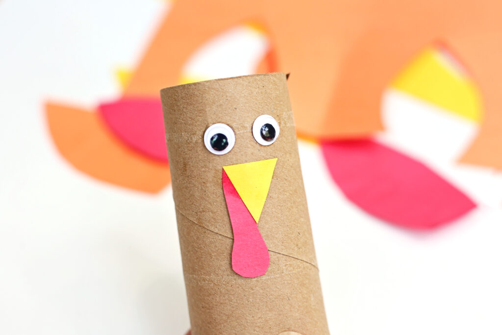 Glue Wattle and Beak - Cultivating Brilliant Minds a close up of the toilet paper roll with eyes and a beak glued on