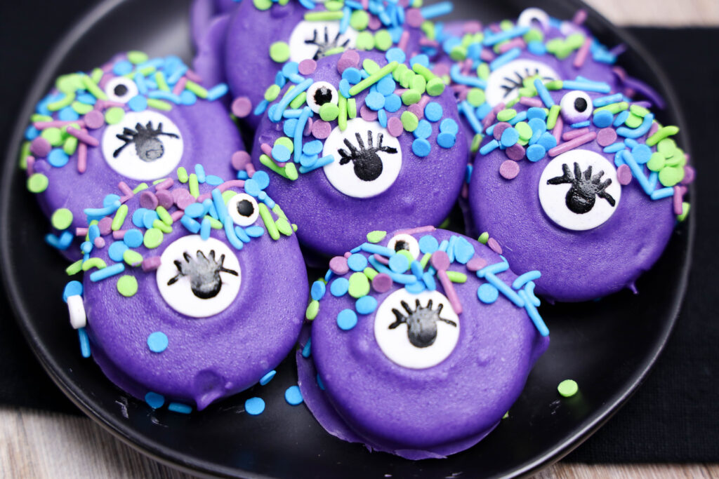 Monster Oreos - Cultivating Brilliant Minds Monster Oreos on a black plate