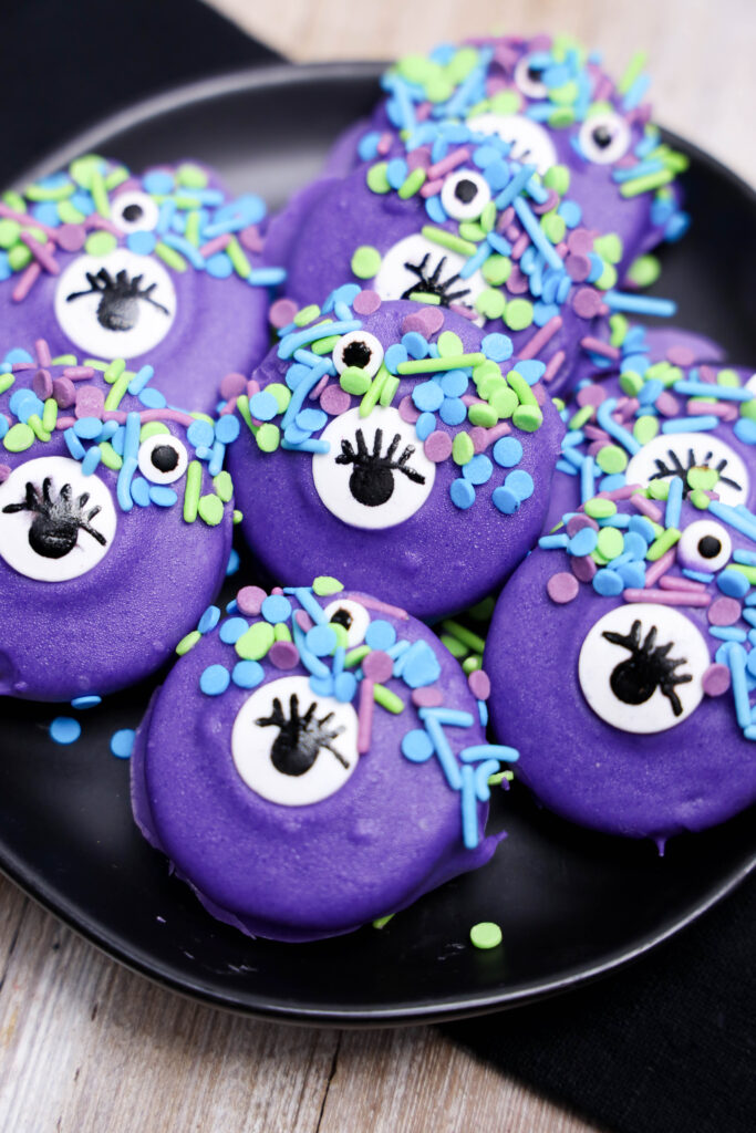 Monster Oreos - Cultivating Brilliant Minds Monster Oreos on a black plate