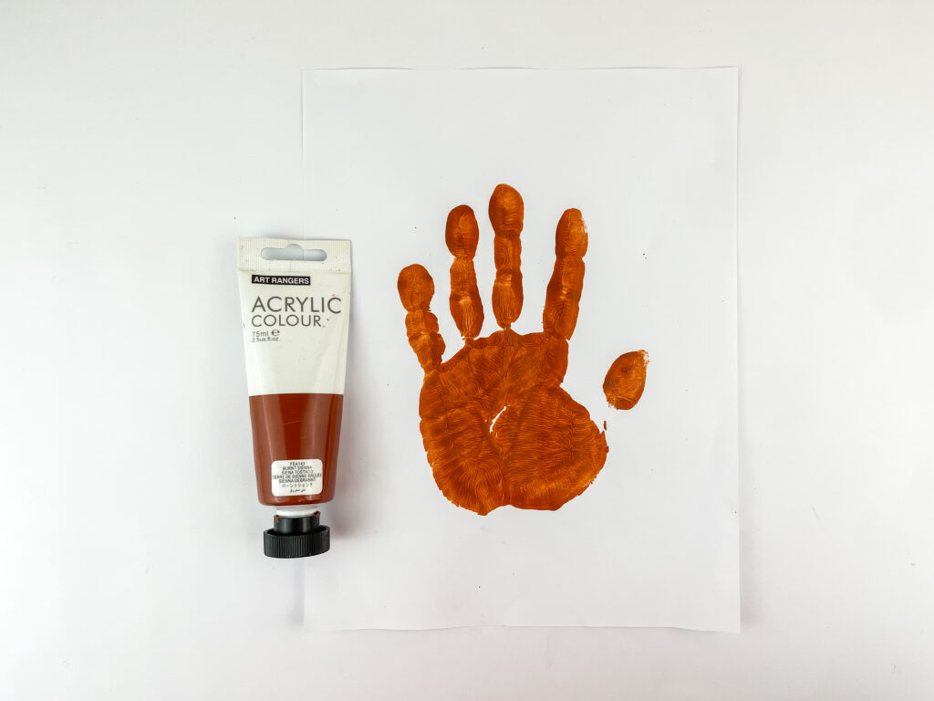 Photo 7-18-25 10 22 05 PM - Cultivating Brilliant Minds handprint using brown paint