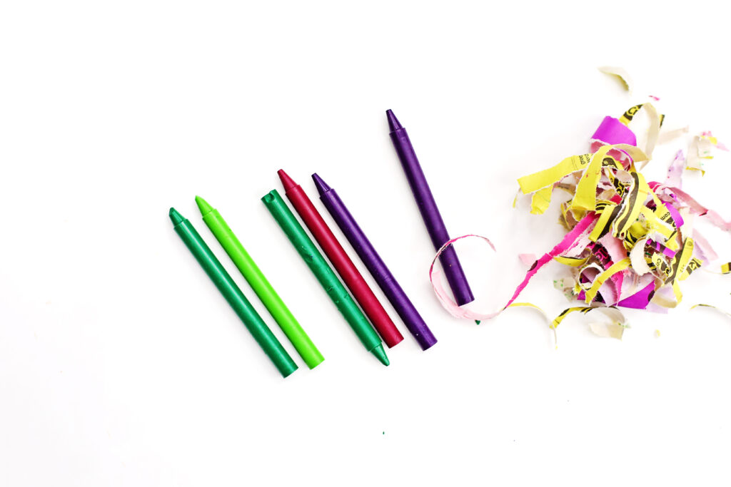 Tear off paper - Cultivating Brilliant Minds a close up of crayons with the wrapper taken off