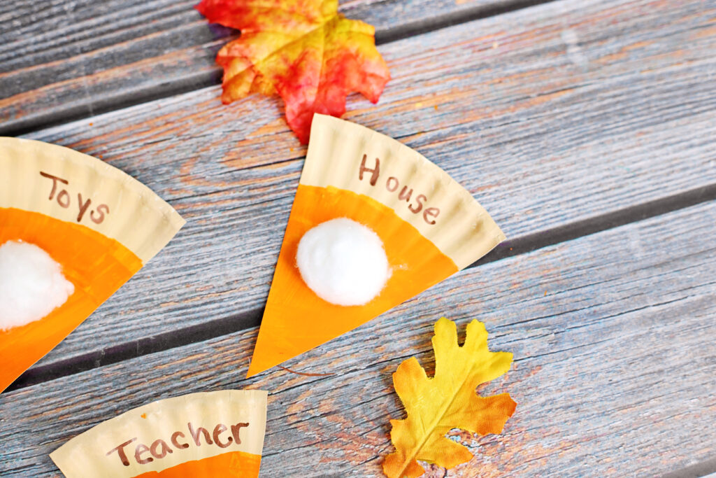 Thankful Pumpkin Pie Craft Final 4 - Cultivating Brilliant Minds Thankful Pumpkin Pie slices reading "house, toys, teacher"
