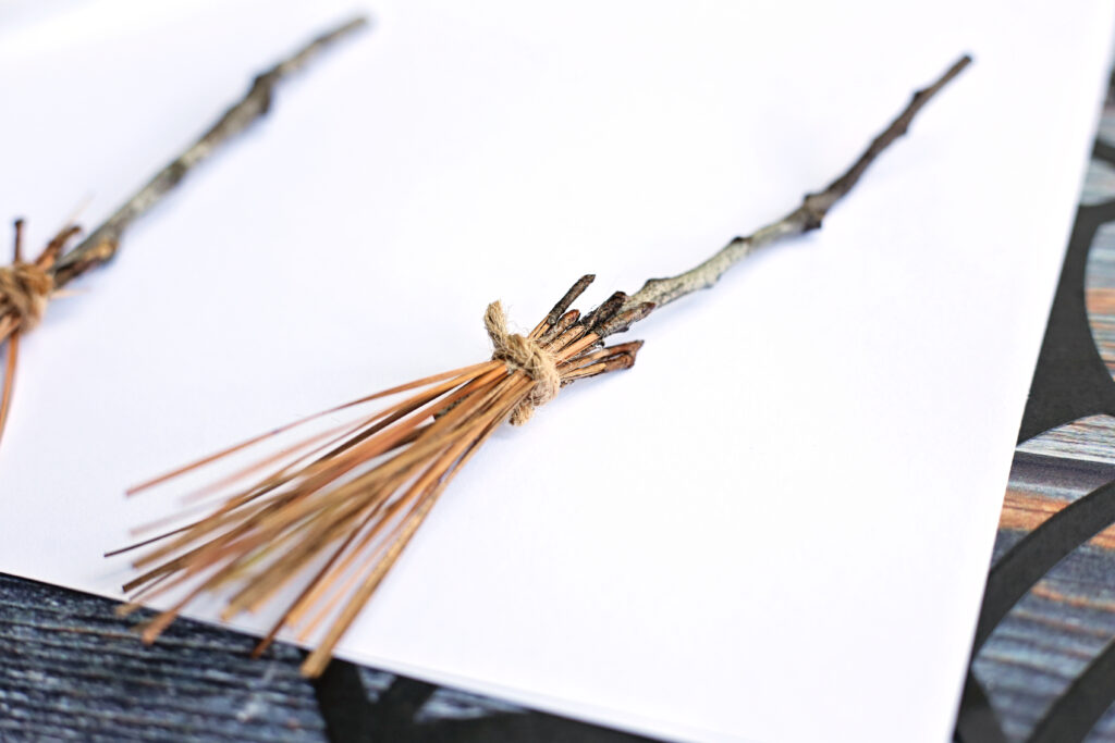 Tie Twine - Cultivating Brilliant Minds sticks tied together with twine