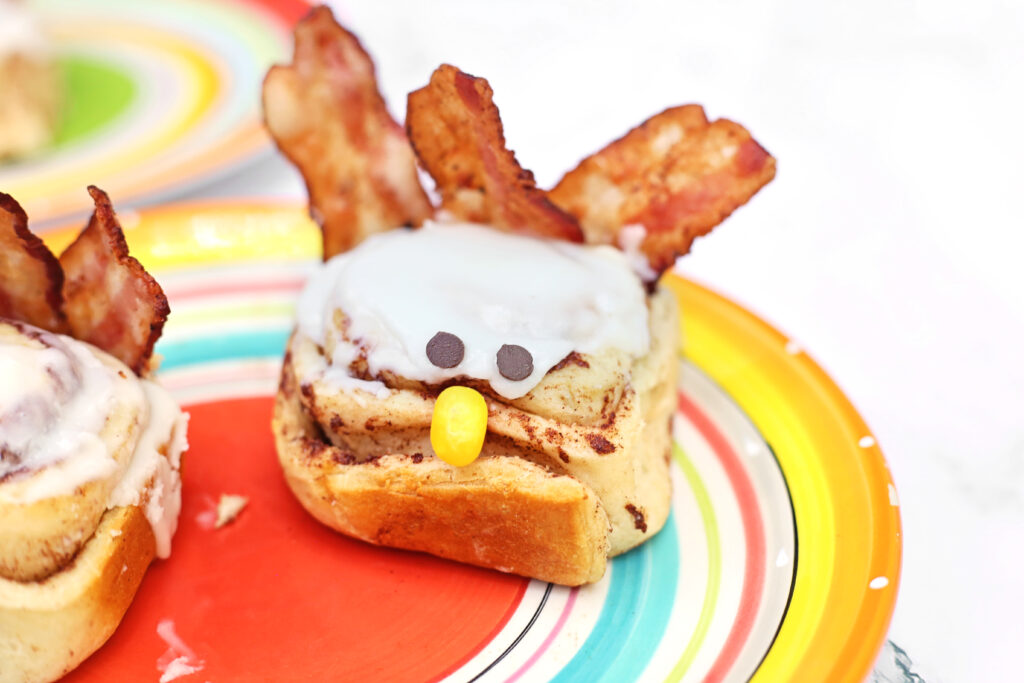 Turkey Cinnamon Rolls Final 5 - Cultivating Brilliant Minds turkey cinnamon rolls on a multicolored plate