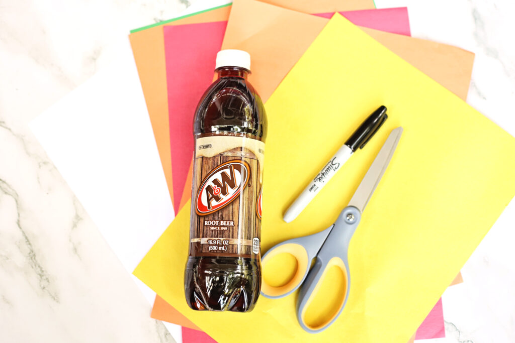 Turkey Root Beer Drink Supplies - Cultivating Brilliant Minds Turkey Root Beer Drink supplies: a bottle of root beer, scissors, a black marker, and construction paper