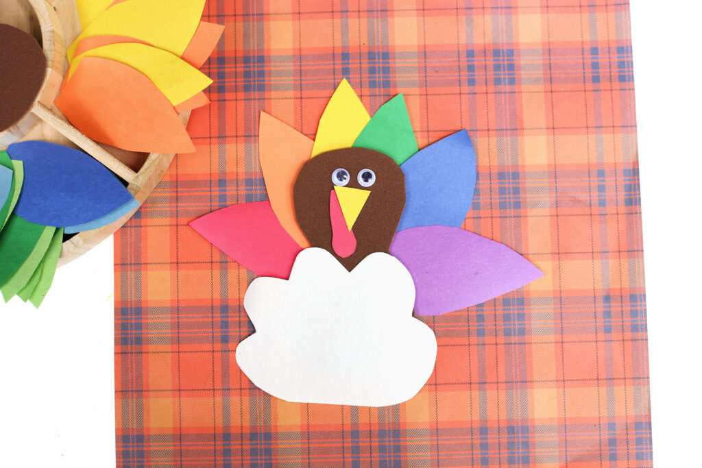 Turkey in Disguise Craft 4 - Cultivating Brilliant Minds turkey in disguise craft on plaid paper