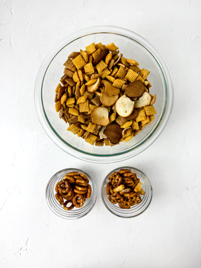 Zombie Muddy Buddies - Cultivating Brilliant Minds chex mix sorted into bowls