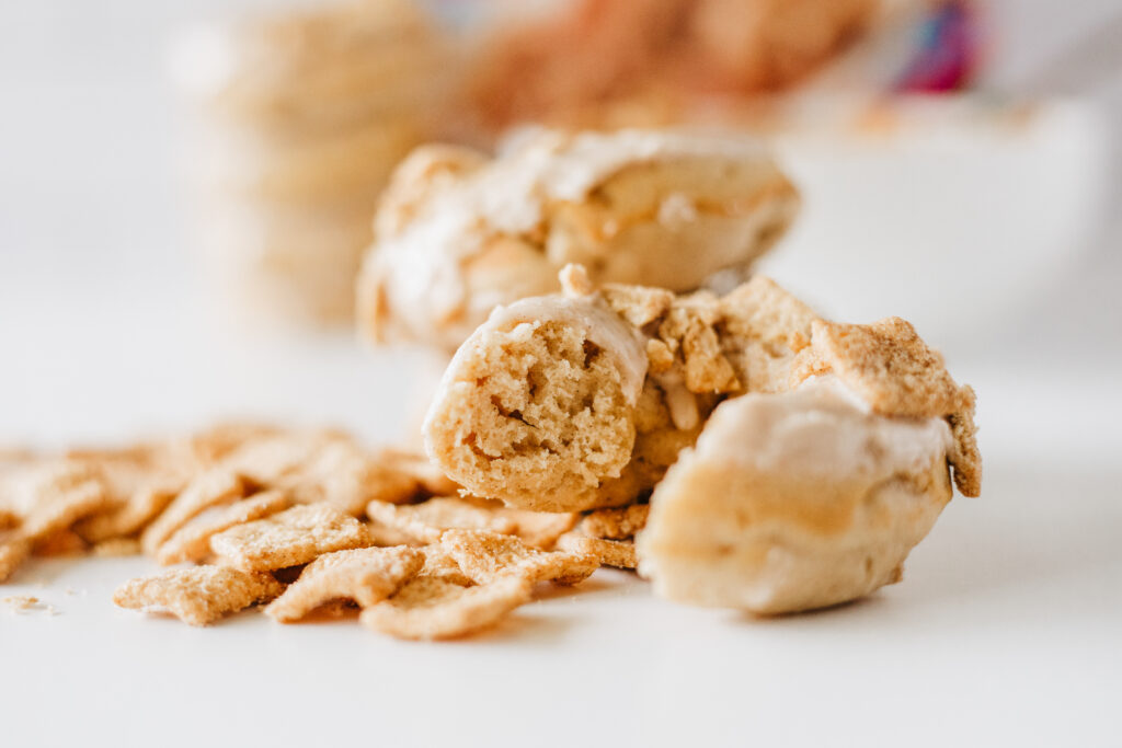 cinnamon toast crunch donuts-06 - Cultivating Brilliant Minds cinnamon toast crunch donut with a bite taken out
