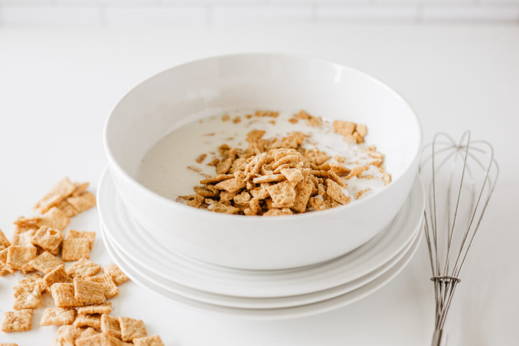 cinnamon toast crunch donuts-45 - Cultivating Brilliant Minds a bowl of cinnamon toast crunch cereal and buttermilk