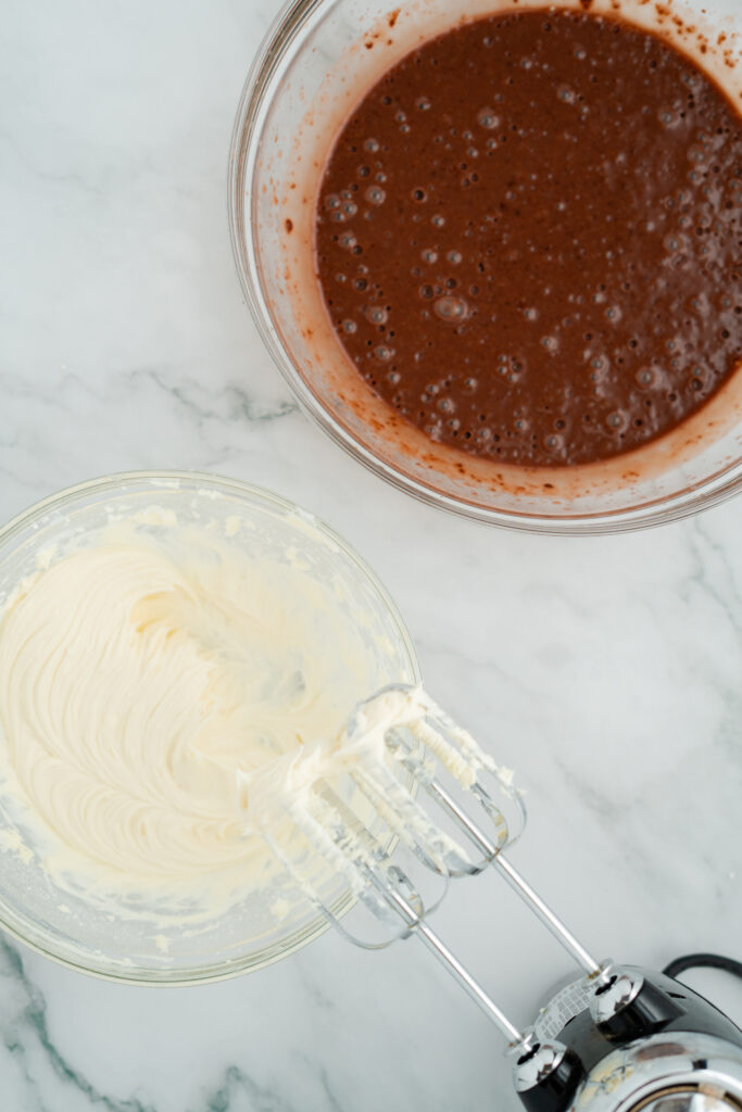 dirtcakecups-07828 - Cultivating Brilliant Minds cake batter in a bowl and cream cheese batter in a bowl with beaters