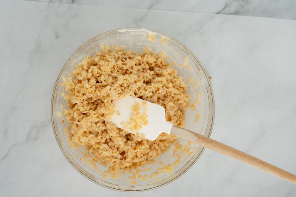 ghostricekrispiecake-08283 - Cultivating Brilliant Minds mix melted butter, marhsmallows, and rice krispies