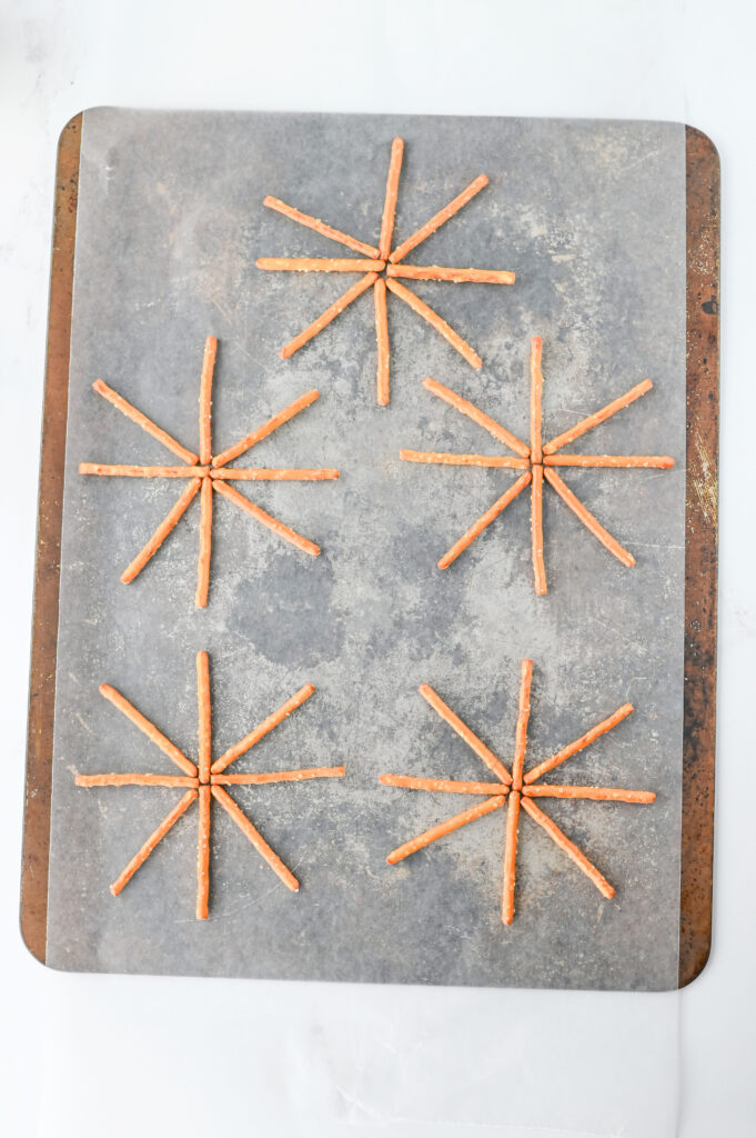 pretzelspiderwebs2 - Cultivating Brilliant Minds pretzels laid out on parchment paper