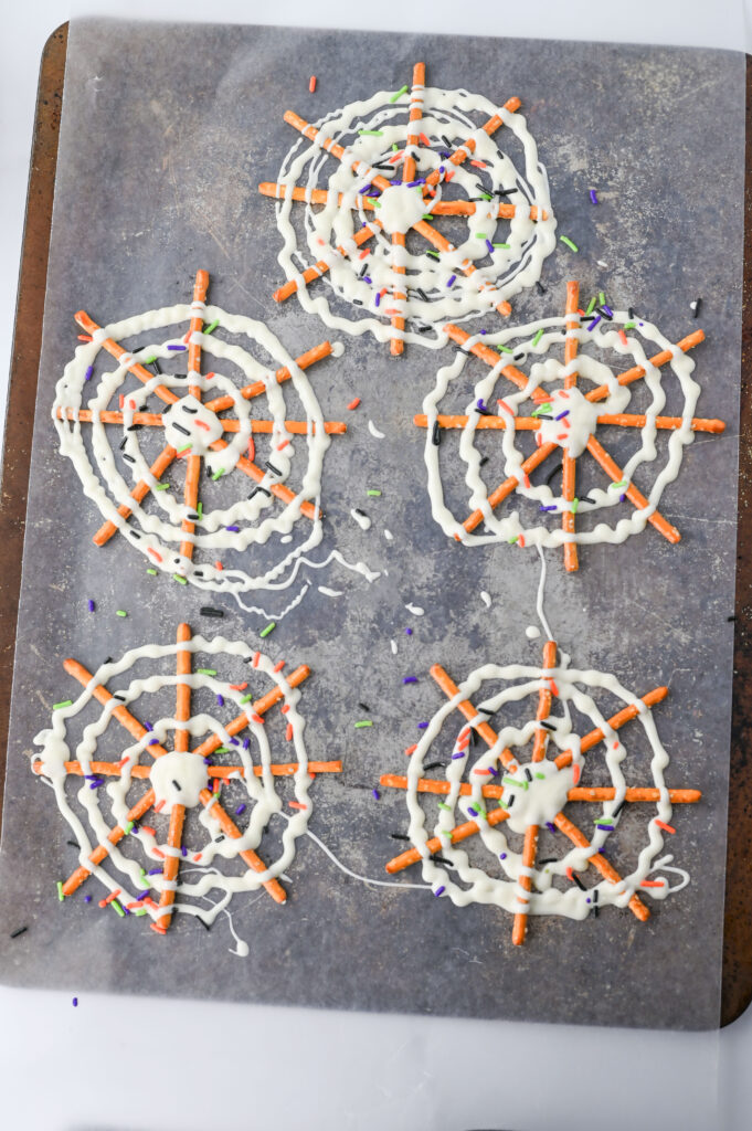 pretzelspiderwebs4 - Cultivating Brilliant Minds spider web pretzels on parchment paper