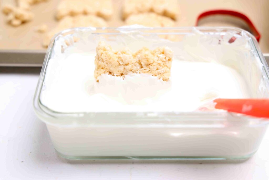 Ghost Rice Krispie Treats - Cultivating Brilliant Minds rice krispie treat dipped in melted white chocolate