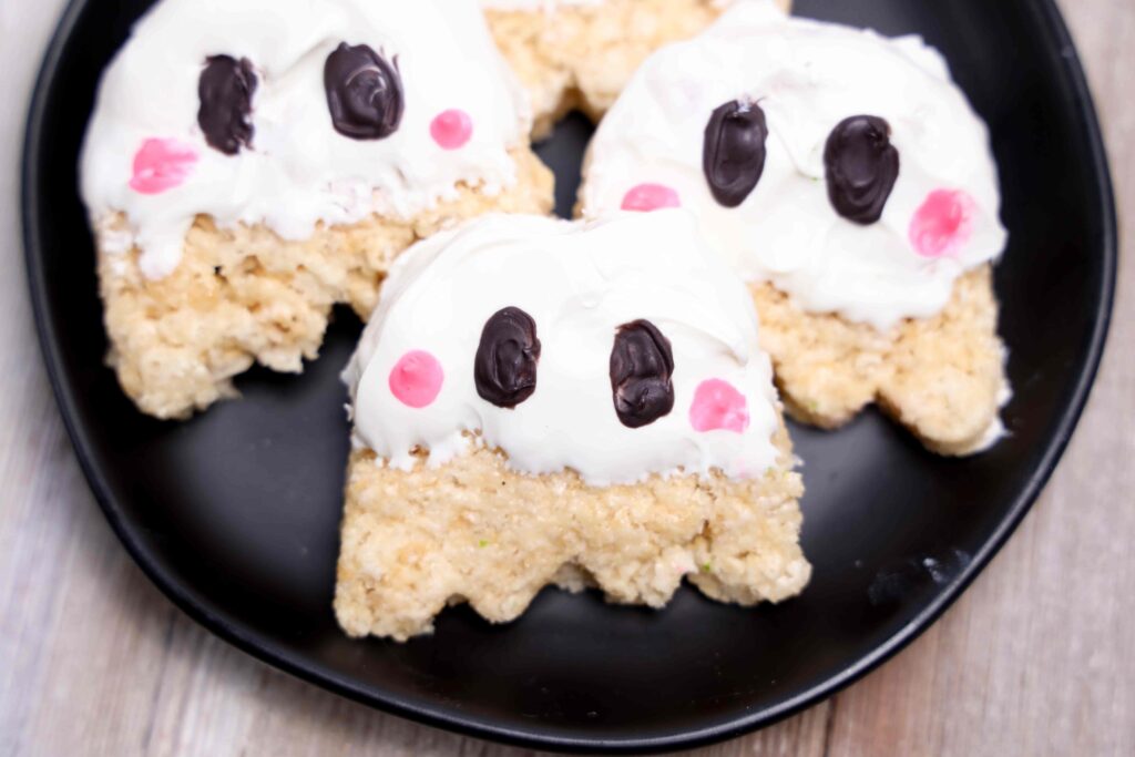 Ghost Rice Krispie Treats - Cultivating Brilliant Minds Rice Krispies decorated to look like ghosts