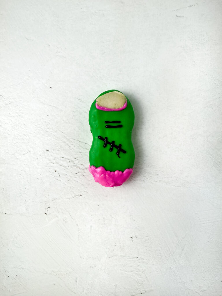 Nutter Butter Zombie Fingers - Cultivating Brilliant Minds Nutter Butters decorated to look like zombie fingers.
