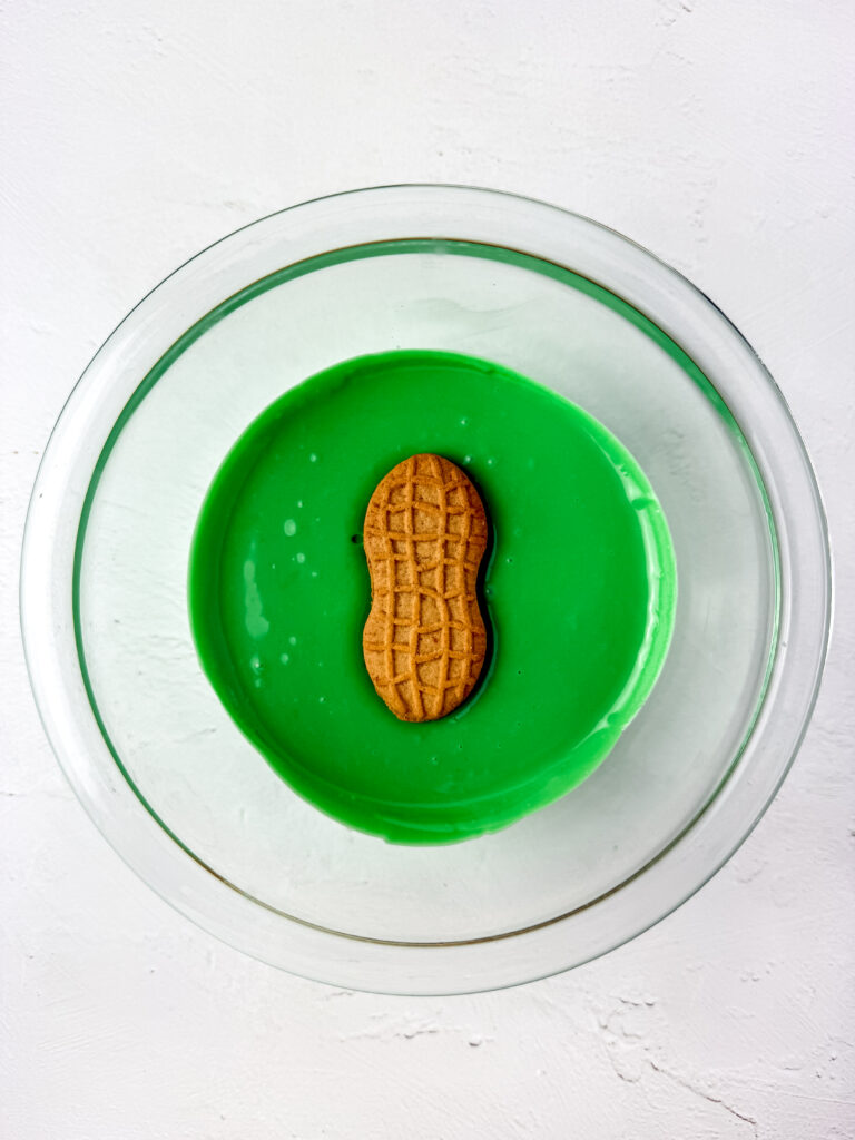 Nutter Butter Zombie Fingers - Cultivating Brilliant Minds nutter butter dipped in melted green colored chocolate