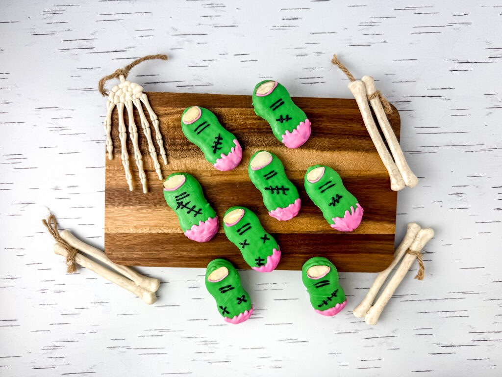 Nutter Butter Zombie Fingers - Cultivating Brilliant Minds Nutter Butters decorated to look like zombie fingers.