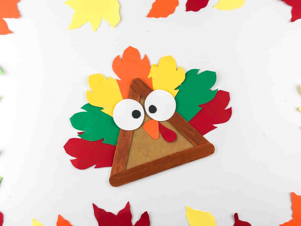Thanksgiving Turkey Popsicle Stick Craft - Cultivating Brilliant Minds turkey craft made of popsicle sticks