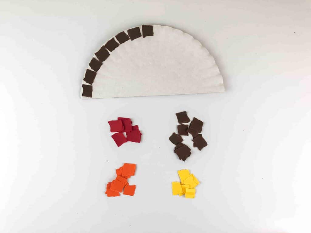 Thanksgiving Torn Paper Turkey Craft - Cultivating Brilliant Minds A turkey craft made from torn paper