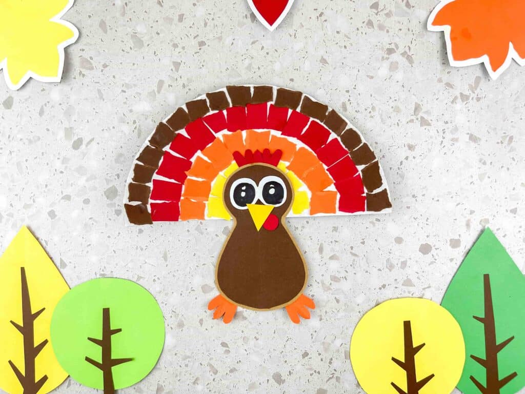 Thanksgiving Torn Paper Turkey Craft - Cultivating Brilliant Minds A turkey craft made from torn paper